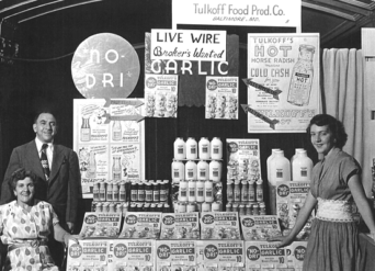 Harry and Lena Tulkoff with daughter Bernice at a 1940s tradeshow featuring the still popular Horseradish and Garlic.