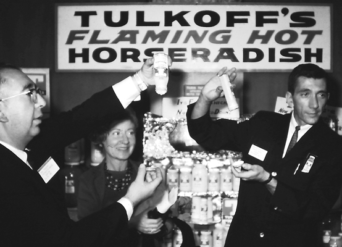 Second generation owners, Sol and Marty Tulkoff, demonstrate the quality of their Horseradish at a 1950s show.